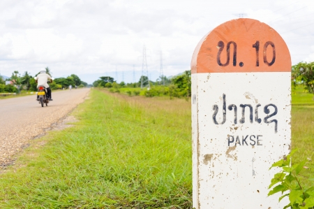 10 kilometer milestone on the National Highway 16E and direction sign to  Pakson to Pakse, Laos の写真素材