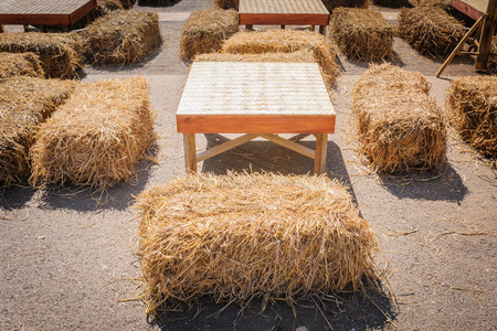 table and straw chair in contryside の写真素材