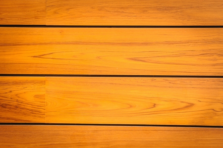 Modern brown pattern of teak wood  in background.の写真素材
