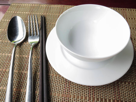 Vietnamese traditional eating tool with bowl, chopstick, spoon, forkの写真素材