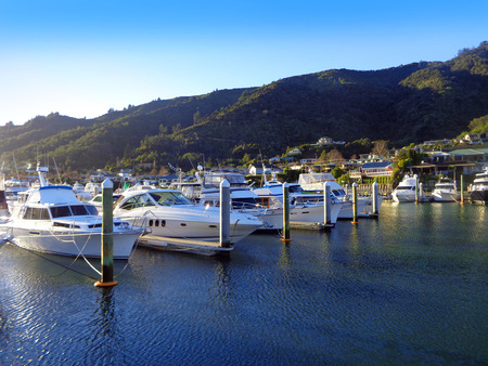 Beautiful Harbor of Picton New Zealand. Turquoise Ocean with Yachts and Boatsの写真素材