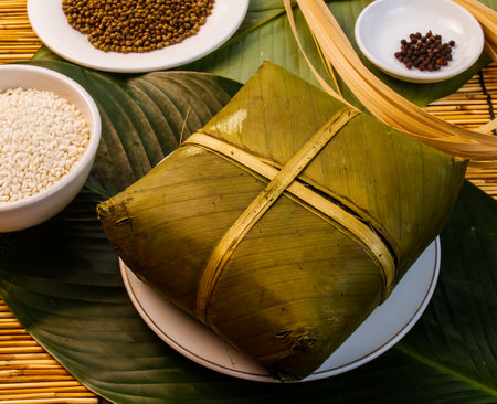 Vietnamese Lunar New Year rice tray, Vietnamese traditional rice cake to celebrate the Lunar new year and boiled green vegetablesの写真素材
