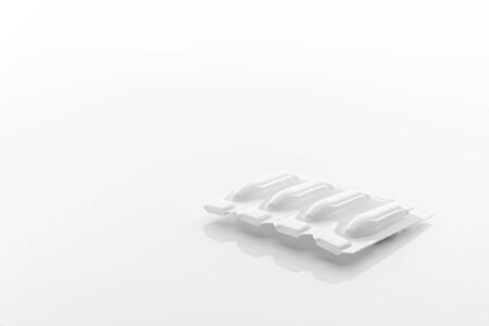 Suppository for anal or vaginal use on a white background. Candles for treatment of hemorrhoids, temperature, thrush, inflammationの写真素材