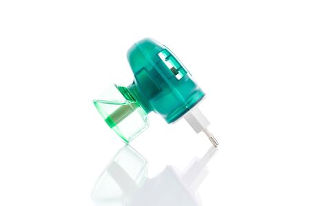 Anti-mosquito electric repellent. Mosquito electrical fluid fumigator at home isolated on whiteの写真素材