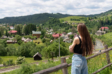 Hiker girl on the mountain top, Ñoncept of freedom, victory, active lifestyleの写真素材