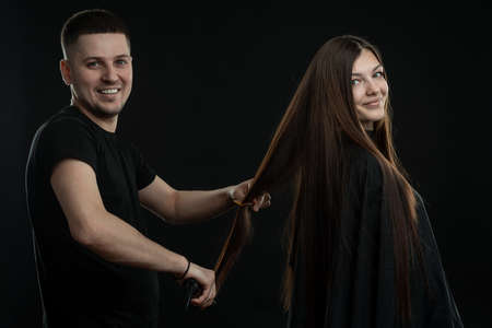 Keratin recovery and treatment with professional iron tool. Laminated long dark shiny hairの写真素材