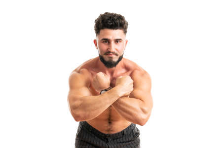 Sporty man with perfect body after training isolated on white background. Strength and motivationの写真素材