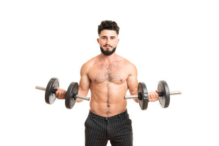 Muscular bodybuilder guy doing exercises with dumbbells isolated over white backgroundの写真素材