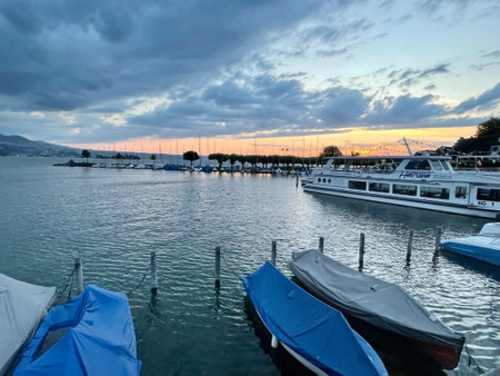 Sunset at the marina with boats and yachts in the background, Rapperswil, Switzerland, 19.07.2023の写真素材