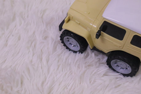 Hot wheels plastic car and transport toys on blurred backgroundの写真素材