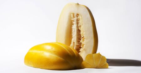 Slided Korean Melon on white backgroundの写真素材