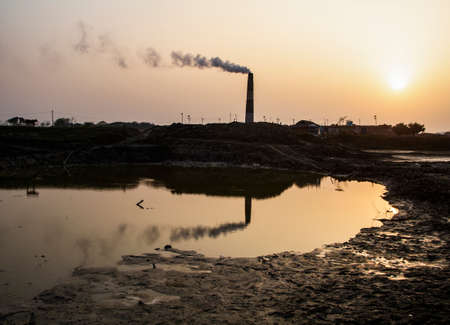 Some beautiful drawing on water made by brick fields smoke.