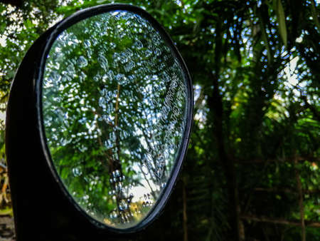 Some rain drops in a mirror.