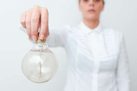 creativity with bulbs illuminated light bulb. concept for idea innovation and inspirationの写真素材