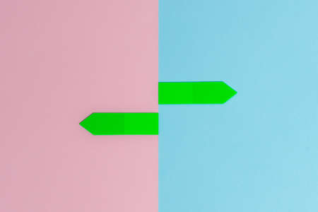 Comparison of Two Objects Blocks Pencils Sticker Notes Facing Inward Outward Making An Arrangement Reflection On a Separated Coloured Background Shot In A Flat Lay Perspectiveの写真素材