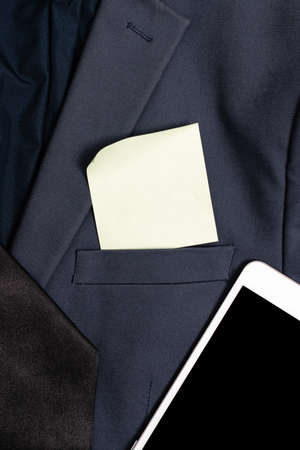 Presenting New Proper Work Attire Designs, Displaying Formal Office Clothes, Writing Important Notes,Abstract Reporter Outfit, Getting Clothing Measurementの写真素材