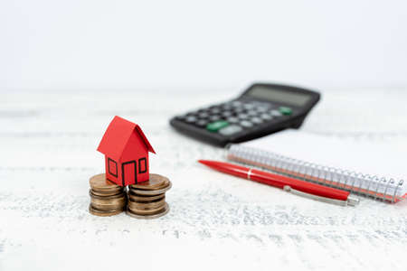 Selling Land Ownership, Investing New Property, Creating Sale Contract, Buying Newly Built House, Calculating Monetary Resources, Planning Family Futureの写真素材