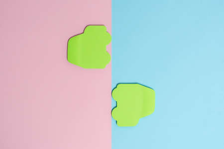 Comparison of Two Objects Blocks Pencils Sticker Notes Facing Inward Outward Making An Arrangement Reflection On a Separated Coloured Background Shot In A Flat Lay Perspectiveの写真素材