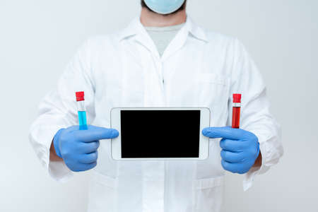 Research Scientist Presenting New Medicine, Researching Preventive Measures, Explaining Scientific Problems, Laboratory Experimentation, Smartphone Callsの写真素材