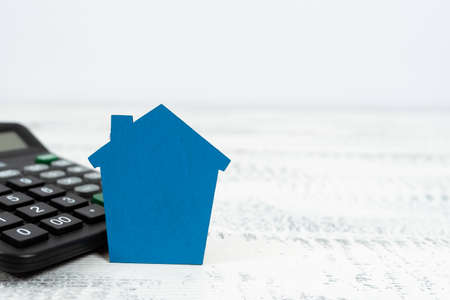 Selling Land Ownership, Investing New Property, Creating Sale Contract, Buying Newly Built House, Calculating Monetary Resources, Planning Family Futureの写真素材