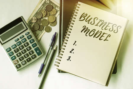 Writing displaying text Business Model. Concept meaning model showing how a company operates to generate more profit Inspirational business technology concept with copy spaceの写真素材