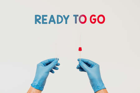 Hand writing sign Ready To Go. Business showcase prepared and suitable to move or to travel to another place Research Scientist Presenting New Medicine, Researching Preventive Measureの写真素材