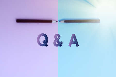 Conceptual caption Q And A. Business overview in which an individual asks questions and another one to answers them Two Objects Arranged Facing Inward Outward On a Separated Coloured Backgroundの写真素材