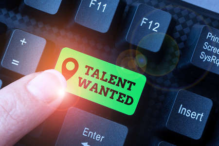 Handwriting text Talent Wanted. Business concept method of identifying and extracting relevant...