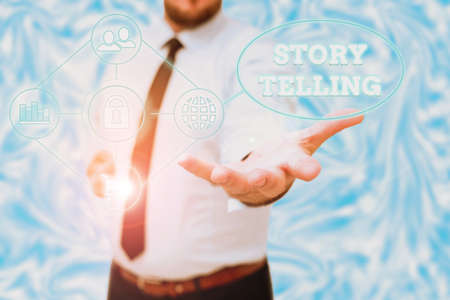 Text sign showing Story Telling. Concept meaning narrative style of uttering sequence of events in order Gentelman Uniform Standing Holding New Futuristic Technologies.の写真素材
