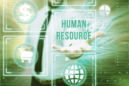 Text sign showing Human Resource. Business overview a critical department handling the staffing and employees concern Gentelman Uniform Standing Holding New Futuristic Technologies.の写真素材