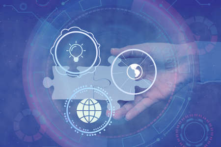 Hand Holding Jigsaw Puzzle Piece Unlocking New Futuristic Technologies. Palm Carrying Puzzles Part...