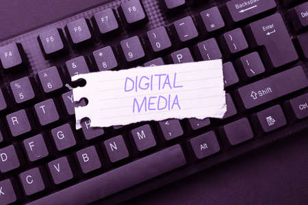 Text caption presenting Digital Media. Word for Accessing any digitized content using etechnology system Typing New Educational Textbook, Abstract Retyping Old Essay Onlineの写真素材