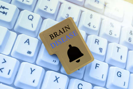 Hand writing sign Brain Disease. Conceptual photo a neurological disorder that deteriorates the...