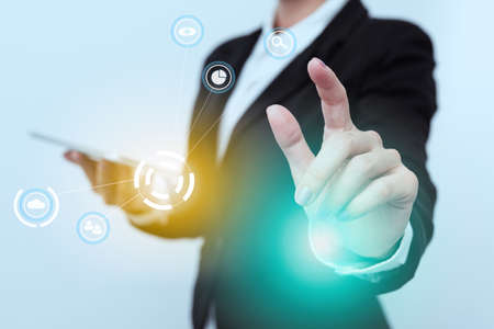 Woman In Uniform Side Standing Carrying Phone Tapping Futuristic Virtual Display Icons. Lady In Suit...