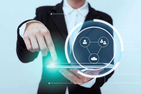 Lady In Suit Standing Pointing On Tablet Showing Futuristic Graphic Interface. Woman In Uniform...