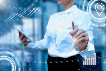 Lady In Uniform Side Standing Holding Tablet In Hand Virtually Typing On Screen. Bussiness Woman Carrying Tab Writing New Futuristic Technologies.の写真素材