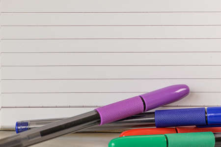 Multiple Assorted Collection Office Stationery Photo With Pens Pencils Notepads Notebook Ruler Stapler Scissors Clippers Paper Clips Holders Clipboard Placed Over Tableの写真素材