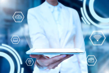 Lady In Uniform Standing Holding Tablet In Hand Presenting Virtual Modern Technology. Business Woman...