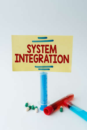 Hand writing sign System Integration. Business showcase process of bringing together the component subsystem Writing Important Medical Notes Laboratory Testing Of New Infectionsの写真素材