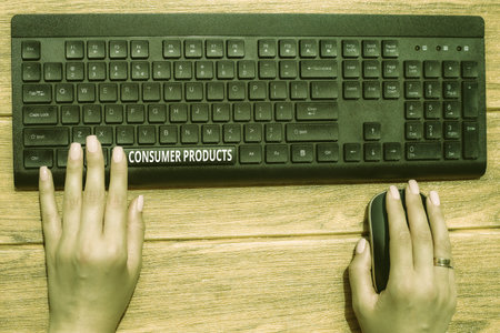 Text caption presenting Consumer Products. Word for goods bought for consumption by the average consumer Hands Pointing Pressing Computer Keyboard Keys Typewriting New Ideas.の写真素材
