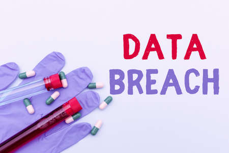 Text caption presenting Data Breach. Word for unauthorized release of confidential and secured details Prescribed Medicine Vitamines And Minerals Pills And Medical Suppliesの写真素材