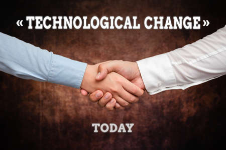 Handwriting text Technological Change. Word Written on increase in the efficiency of a product or...