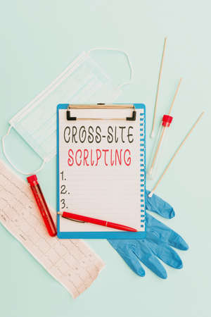 Hand writing sign Cross Site Scripting. Business approach Security vulnerability mainly found in web...