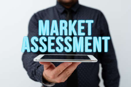 Handwriting text Market Assessment. Word for evaluation of the market for a product or service...
