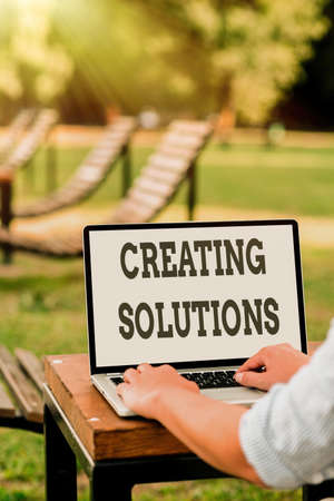 Sign displaying Creating Solutions. Business approach Make ways to solve a problem or dealing with situation Online Jobs And Working Remotely Connecting People Togetherの写真素材