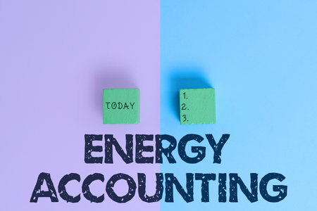 Text showing inspiration Energy Accounting. Business concept measure and report the energy consumption of activities Two Objects Arranged Facing Inward Outward On a Separated Coloured Backgroundの写真素材