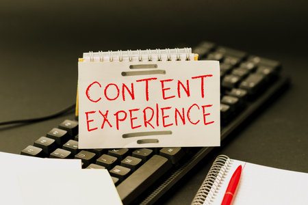 Writing displaying text Content Experience. Business overview environment in which content lives and structured Publishing Typewritten Documents Online, Typing Long Term Contractの写真素材