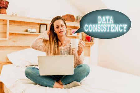 Sign displaying Data Consistency. Conceptual photo data values are the same for all instances of application Reading Interesting Articles Online, Solving Internet Problemsの写真素材
