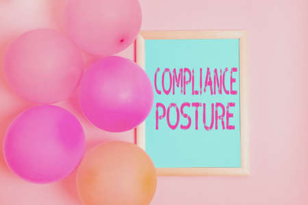 Hand writing sign Compliance Posture, Word Written on manage the defense of the enterprise and...