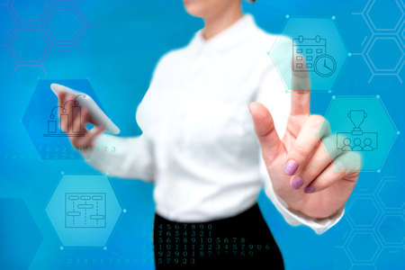 Lady In Uniform Side Standing Holding Tablet In Hand Pressing Virtual Globe Button. Bussiness Woman Carrying Tab Poining For New Futuristic Technologies.の写真素材